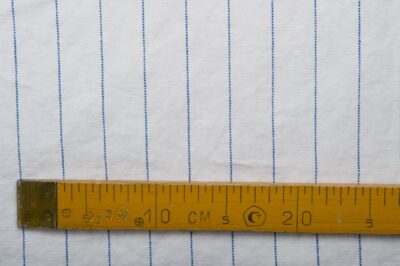 White washed fabric with blue stripes