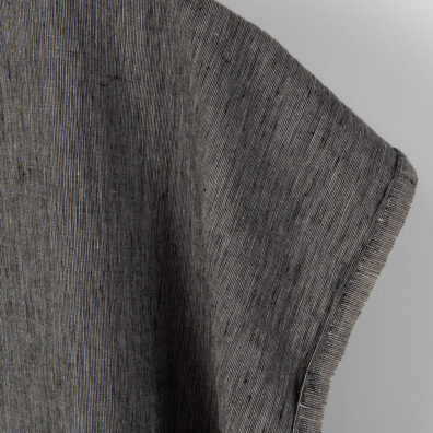 Linen fabric in natural and black, fabric edge