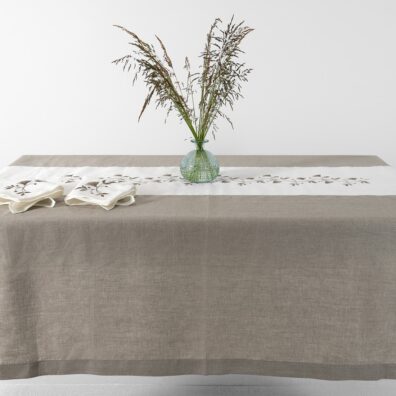 Natural linen tablecloth with white middle, floral stitching
