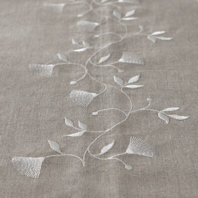 floral motif stitching on natural linen
