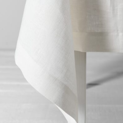 Off-white tablecloth, folded hem