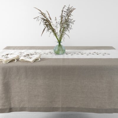 Natural linen tablecloth with white middle, floral stitching