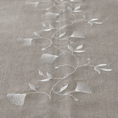 floral motif stitching on natural linen