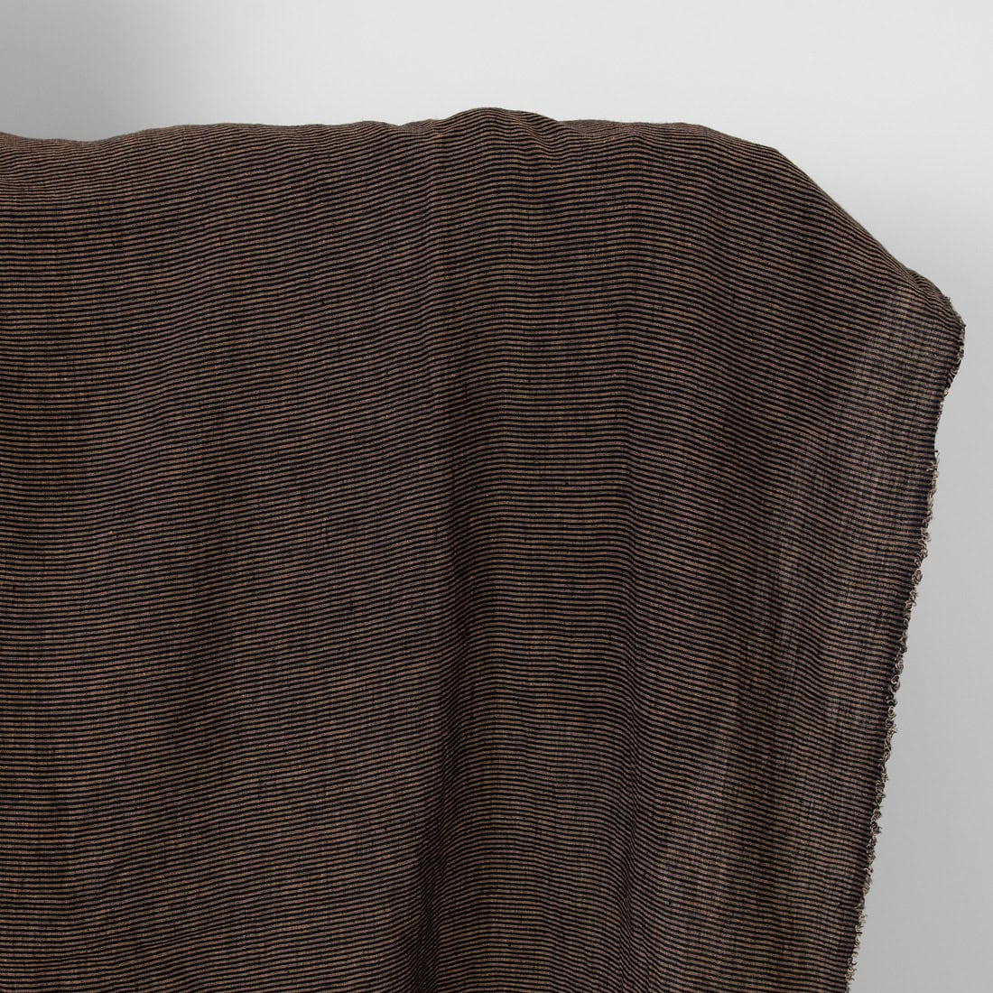 Linen fabric black with small clay stripes washed