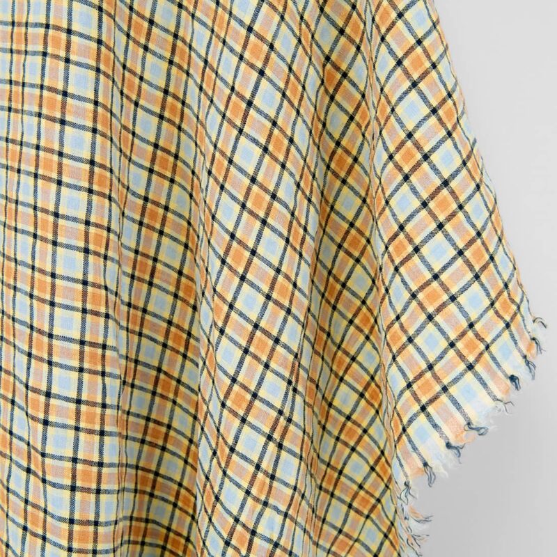 Linen fabric orange and pale blue checks, washed