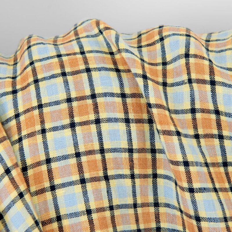 Linen fabric orange and pale blue checks, washed
