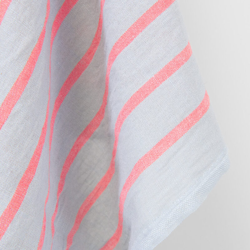 Linen cotton fabric light grey with bright red stripes, washed