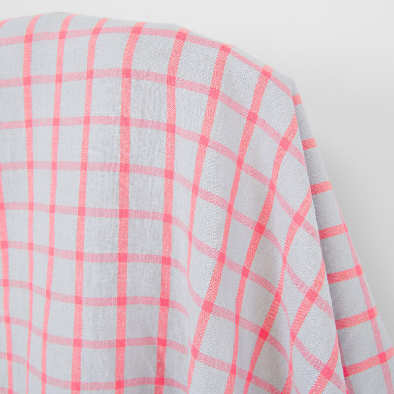 Linen cotton fabric light grey with bright red checks, washed