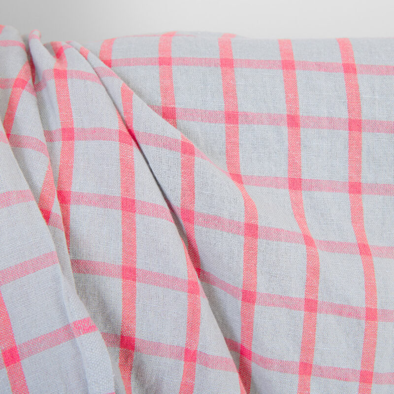 Linen cotton fabric light grey with bright red checks, washed