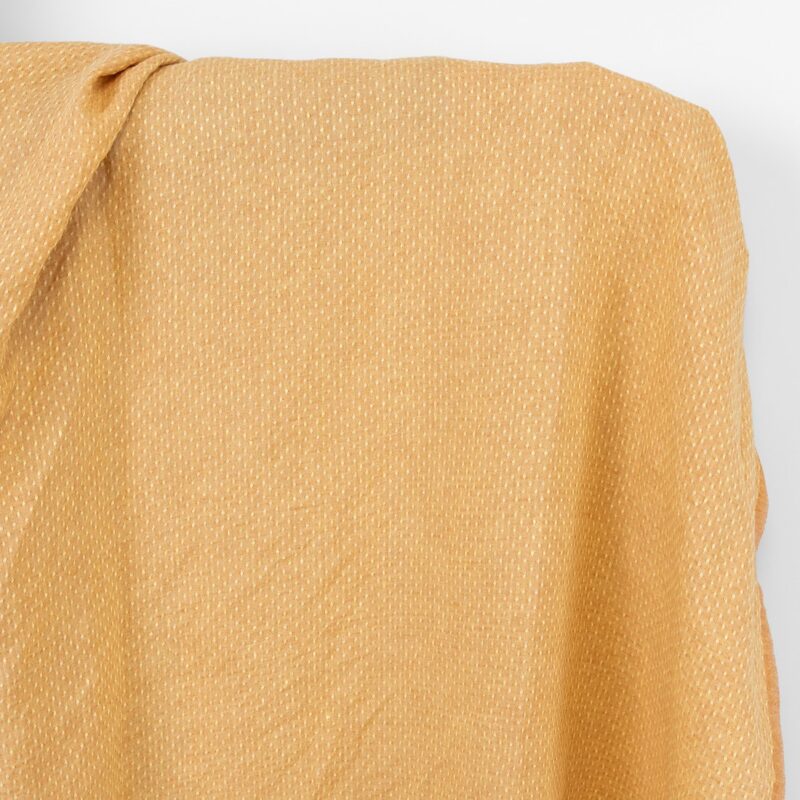 Linen fabric light yellow and clay polka dot, washed