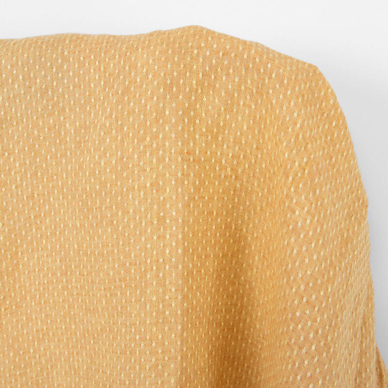 Linen fabric light yellow and clay polka dot, washed