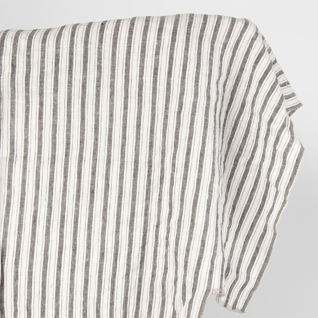 Washed off white linen fabric.