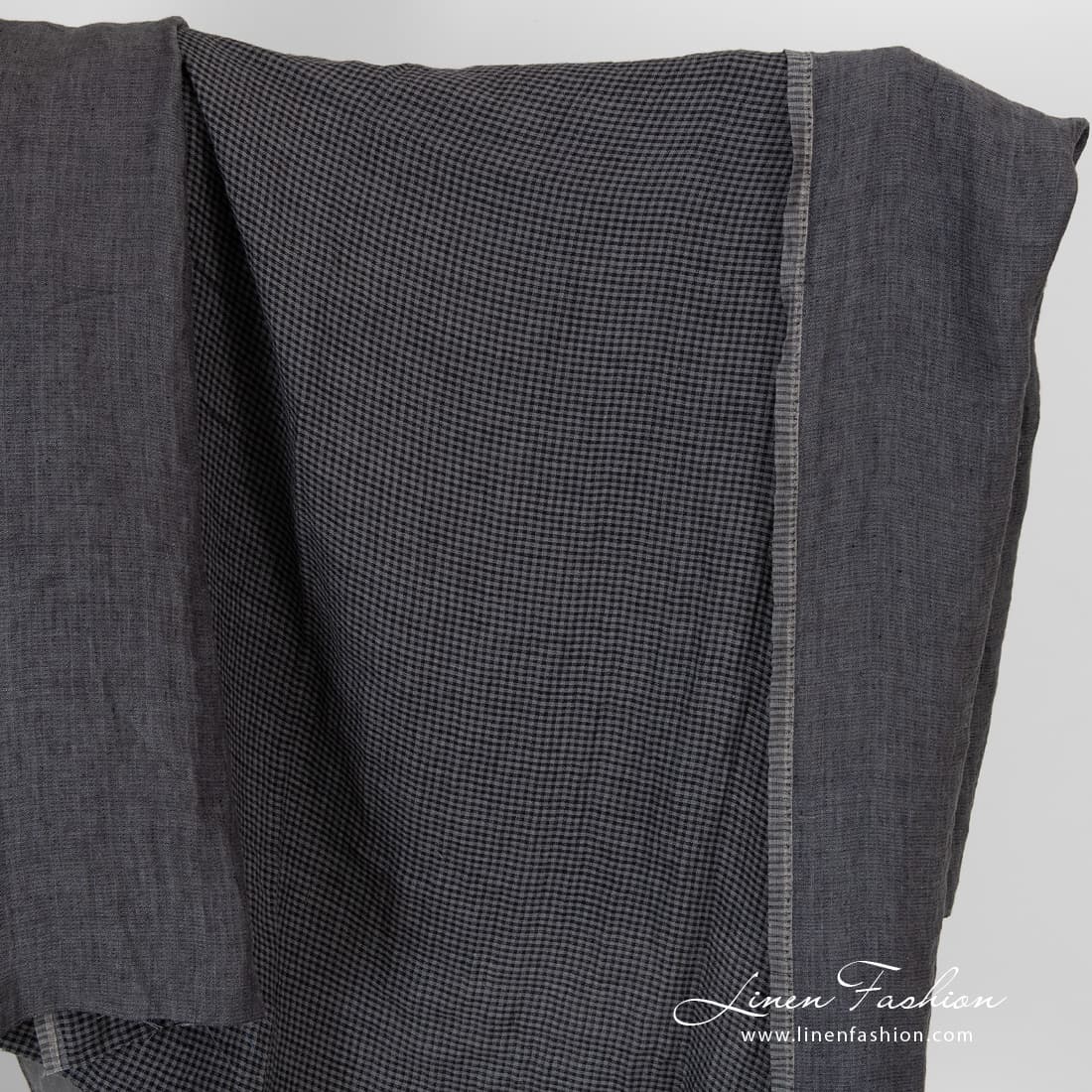 Grey checked double sided linen fabric, washed.