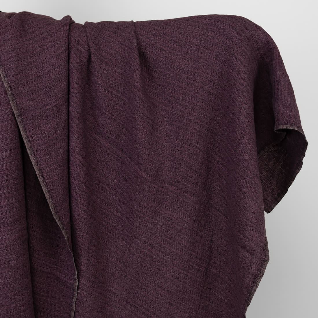 Violet linen fabric in tweed, washed